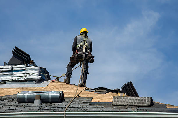 Professional Roof Repair technician working in Woodbourne, PA